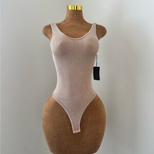 NWT Forever 21 tan ribbed bodysuit in small/medium